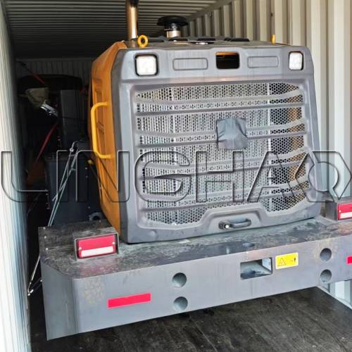 Secure container loading of heavy duty wheel loader at LINGHAO factory